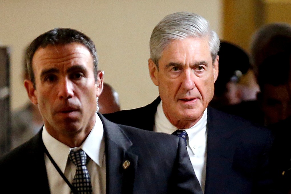 Special Counsel Robert Mueller (R) departs after briefing members of the US Senate on his investigation into potential collusion between Russia and the Trump campaign on Capitol Hill in Washington. Photo: Reuters