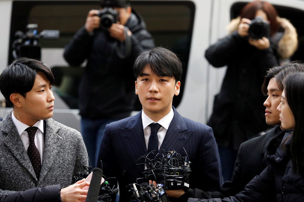 Seungri arrives to be questioned over a sex bribery case at the Seoul Metropolitan Police Agency on March 14. Photo: Reuters