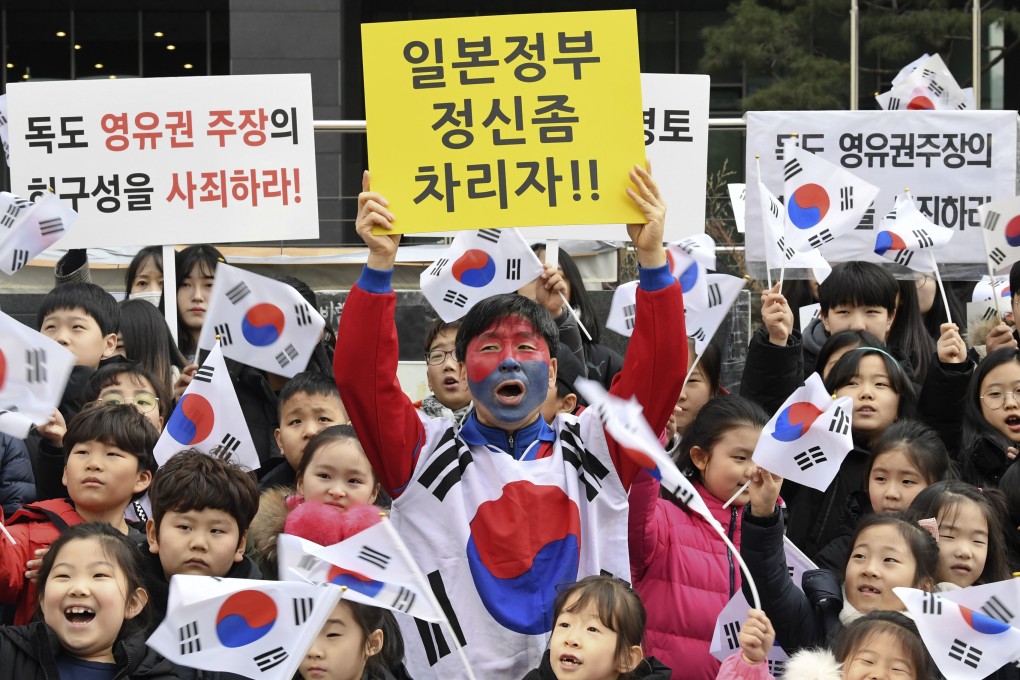 South Koreans stage a rally in front of the Japanese embassy in Seoul to protest Japan's claim of sovereignty over a group of disputed islets. Photo: Kyoto