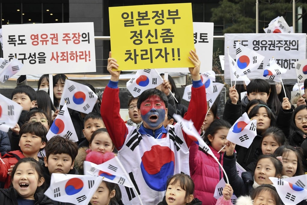 South Koreans stage a rally in front of the Japanese embassy in Seoul to protest Japan's claim of sovereignty over a group of disputed islets. Photo: Kyoto