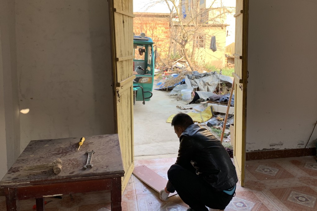 Former Wangshang resident Zhu Xiaoying returned to the village to help his father repair his home after the chemical blast. Photo: Mandy Zuo