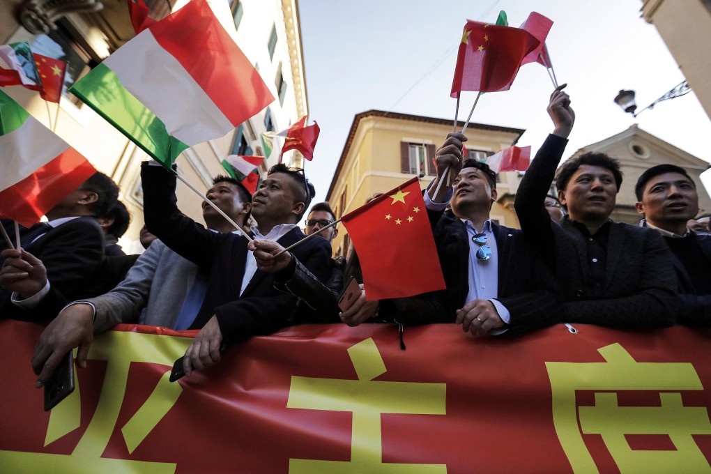 Chinese wait for President Xi Jinping to arrive in Rome on Friday, the first stop on his six-day trip to Europe. Photo: EPA-EFE