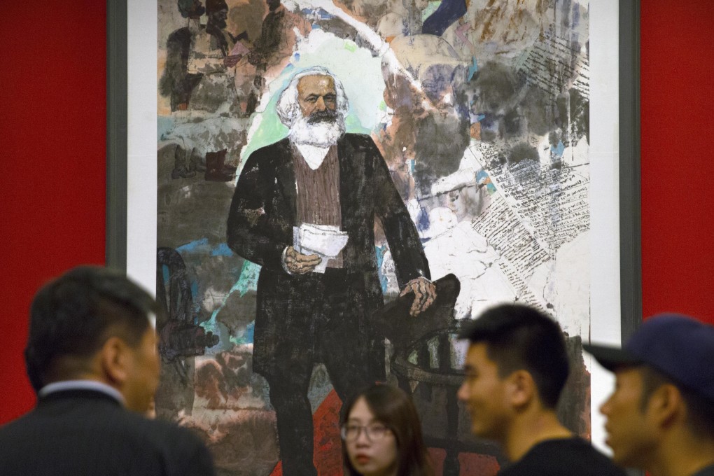 Visitors at an exhibition to commemorate the 200th anniversary of the birth of Karl Marx, at the National Museum in Beijing on May 5, 2018. Photo: AP