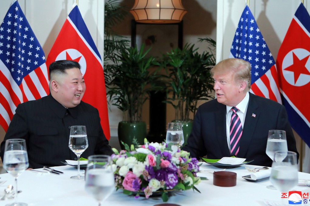 North Korean leader Kim Jong-un and US President Donald Trump dine in Hanoi during their ultimately unsuccessful summit. Photo: EPA