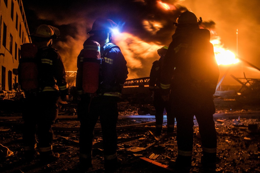 Firefighters assess the damage at Jiangsu Tianjiayi Chemical plant in Xiangshui county, Yancheng, Jiangsu province, where 78 people are known to have been killed by an explosion. Photo: Reuters