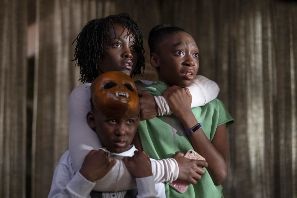 From left, Evan Alex, Lupita Nyong’o and Shahadi Wright Joseph in a scene from Us. Photo: Claudette Barius/Universal Pictures