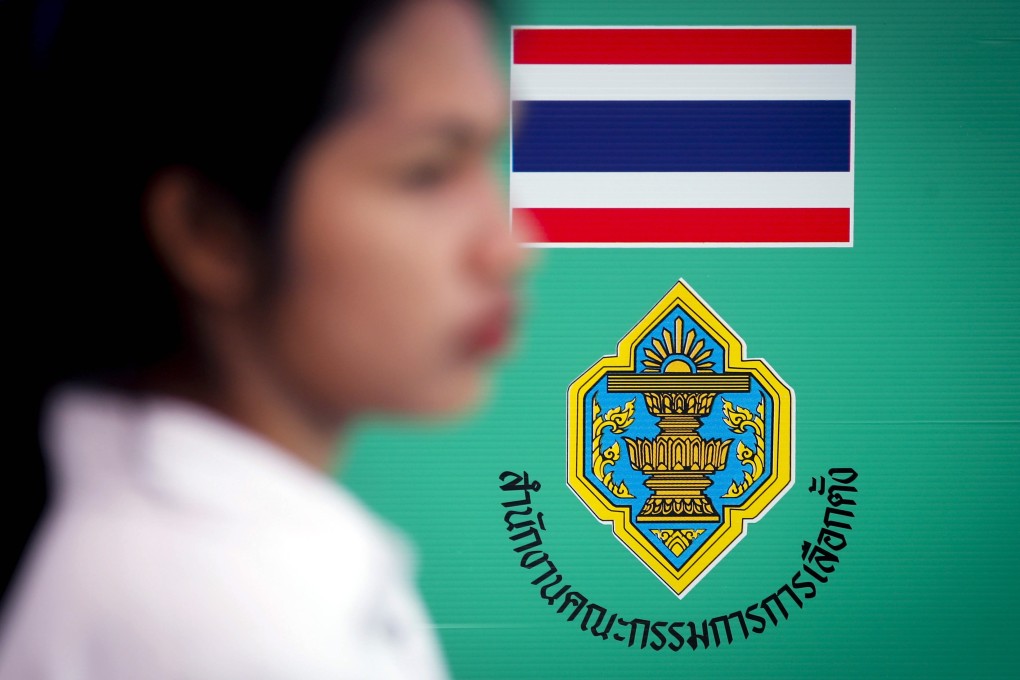A volunteer at a Thai polling station. Photo: EPA