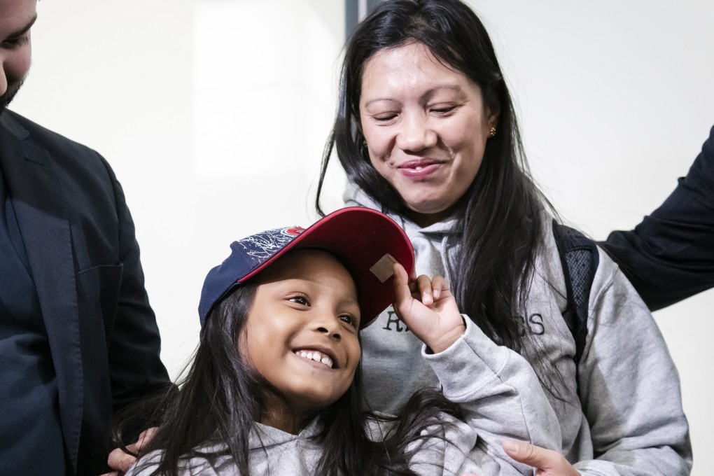 Vanessa Rodel and her daughter, Keana, talk to media at Toronto airport. Photo: The Canadian Press via AP