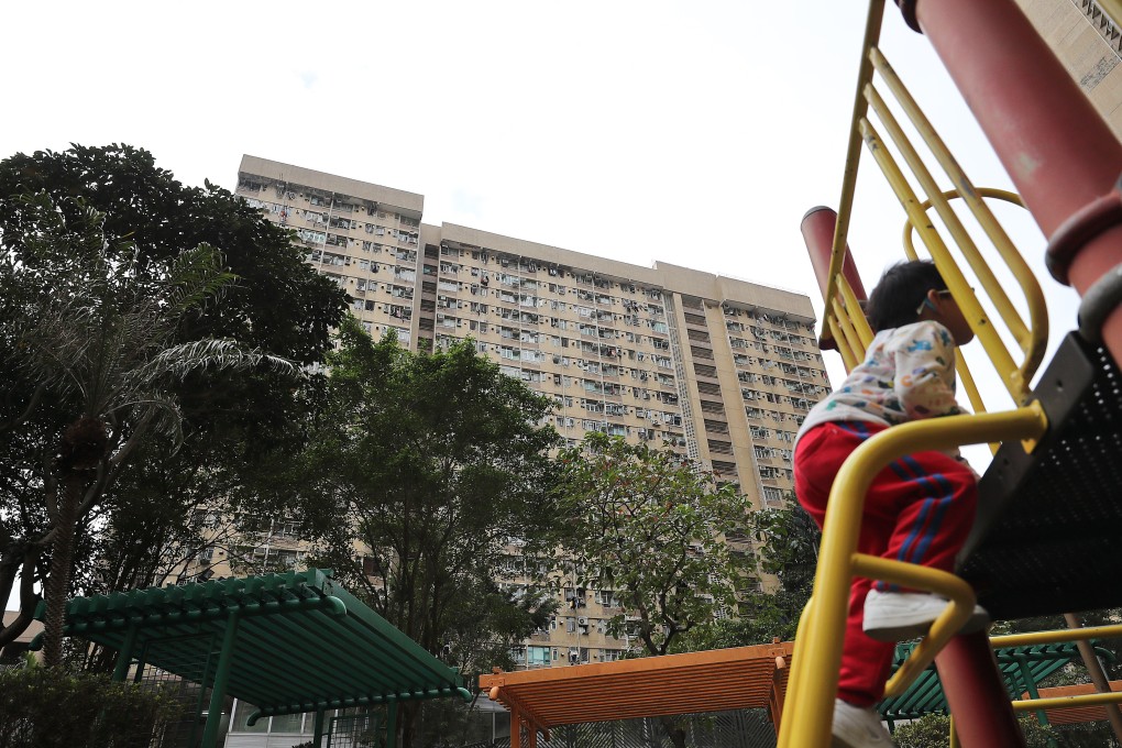 A child plays in front of Oi Wo House in an estate under the Tenants Purchase Scheme in Tai Wo on January 4. By promoting home ownership, the scheme has also facilitated family stability. Photo: Winson Wong