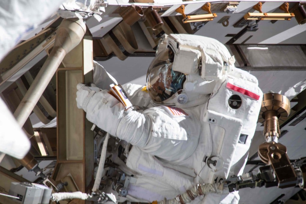 Astronaut Anne McClain on a spacewalk outside the International Space Station on March 22. Photo: Nasa