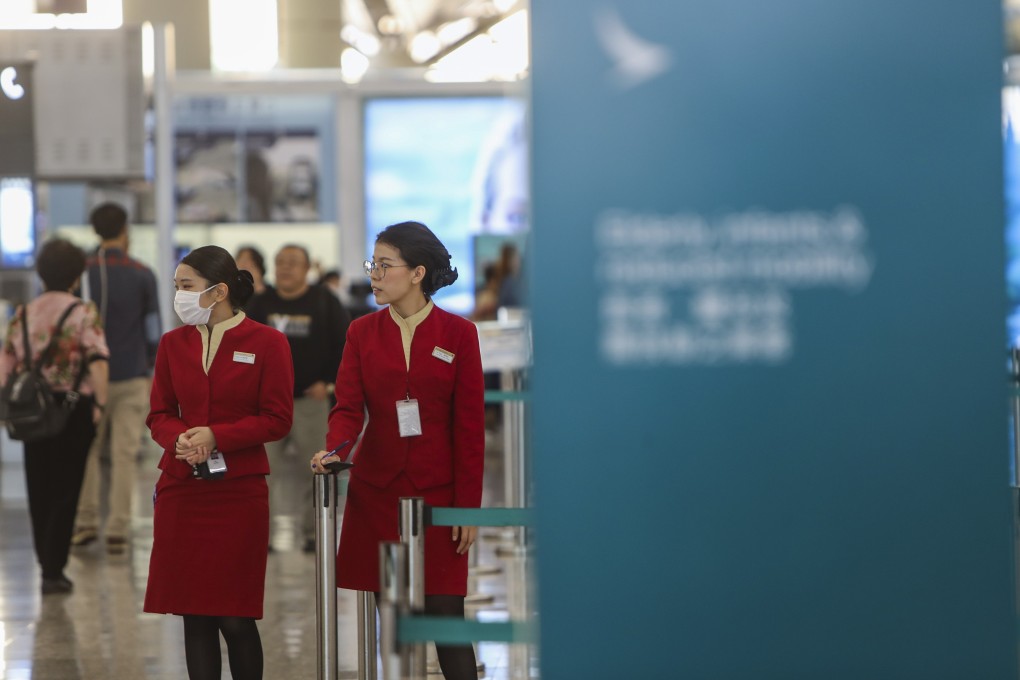 Cathay Pacific says any workers who feel unwell should stay home. Photo: Winson Wong