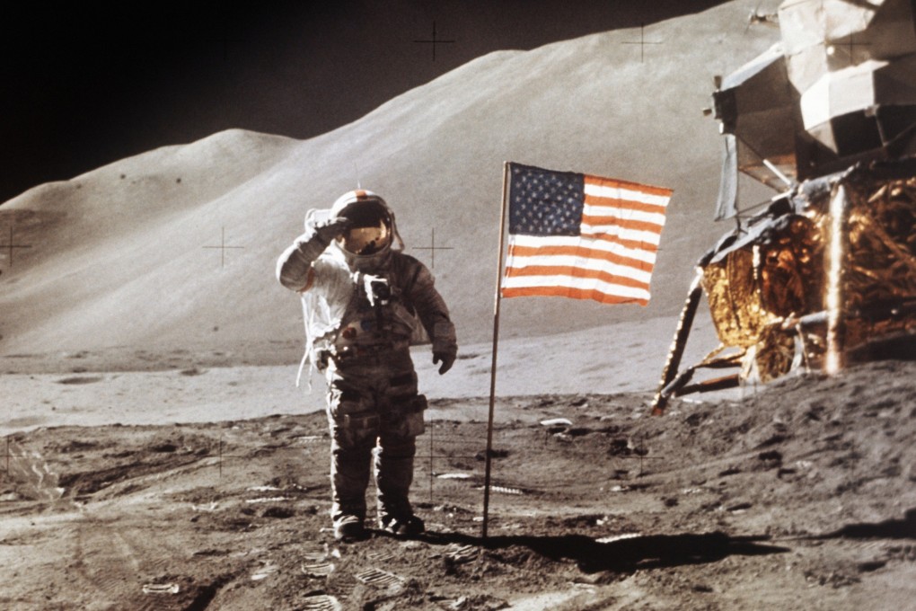 In this July 30, 1971 photo, Apollo 15 Lunar Module Pilot James B. Irwin salutes while standing beside an American flag planted on the surface of the moon. Photo: AP