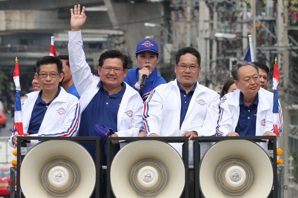 Leaders of the pro-junta political party, Palang Pracharath, greet supporters in Bangkok. Photo: EPA