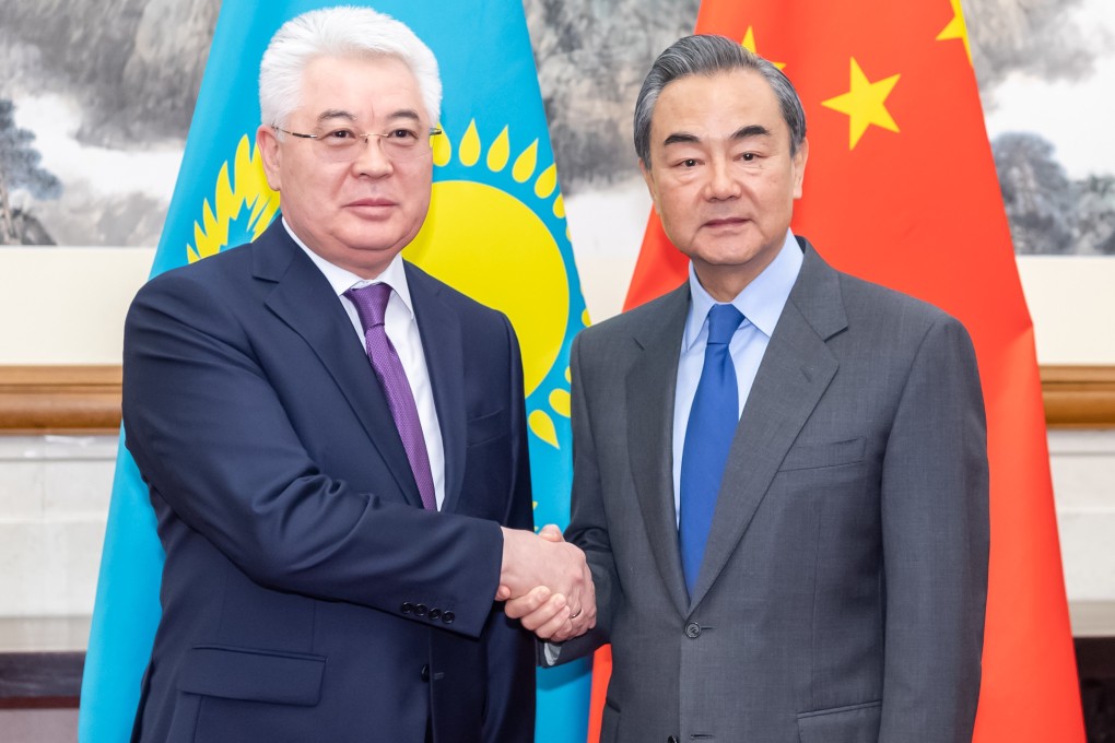 Chinese Foreign Minister Wang Yi and his Kazakh counterpart Beibut Atamkulov meet in Beijing. Photo: Xinhua