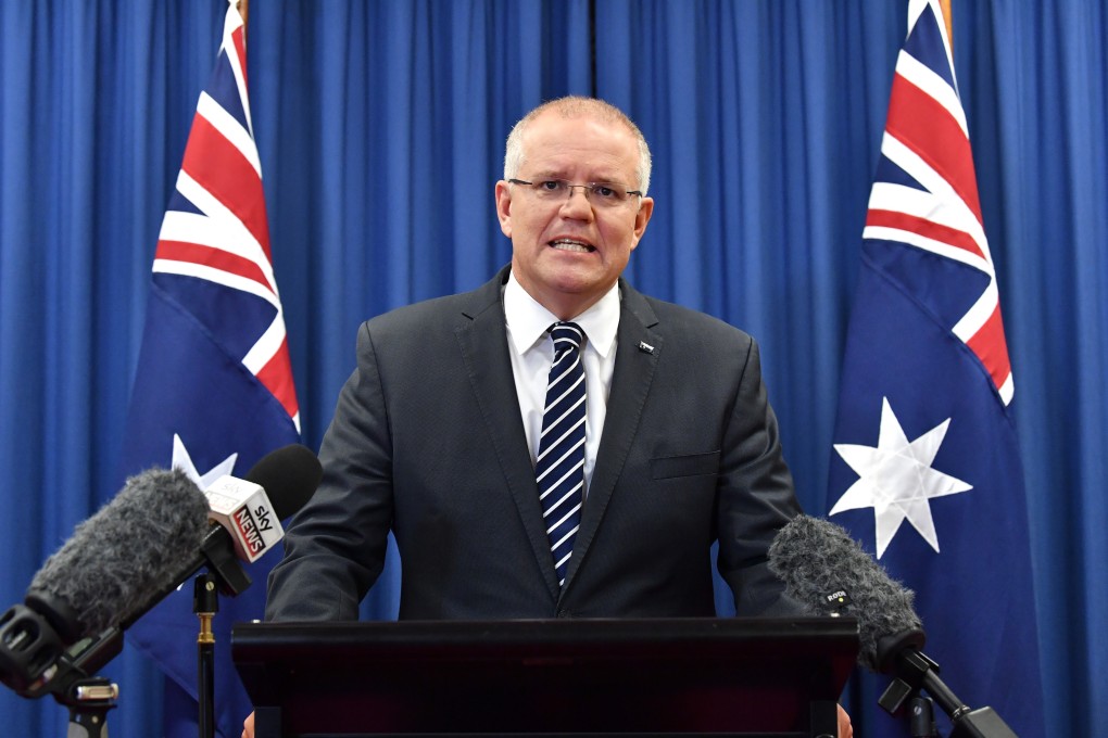 Australian Prime Minister Scott Morrison speaks during a press conference at Waterfront Place in Brisbane. Photo: EPA