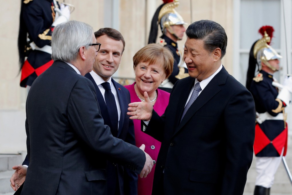 Welcoming Chinese President Xi Jinping are (from left) European Commission President Jean-Claude Juncker, French President Emmanuel Macron and German Chancellor Angela Merkel, at the Elysee Palace in Paris on March 26. The EU, pushed by France and Germany, wants more reciprocity in its trade and investment engagement with China. Photo: Reuters