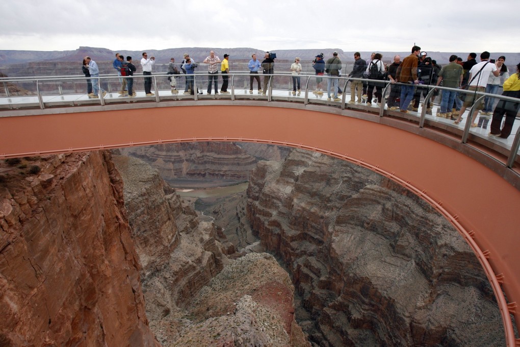 People walk on the Grand Canyon Skywalk on the Hualapai Indian Reservation in Grand Canyon National Park in Arizona, in this file photo. Photo: AP