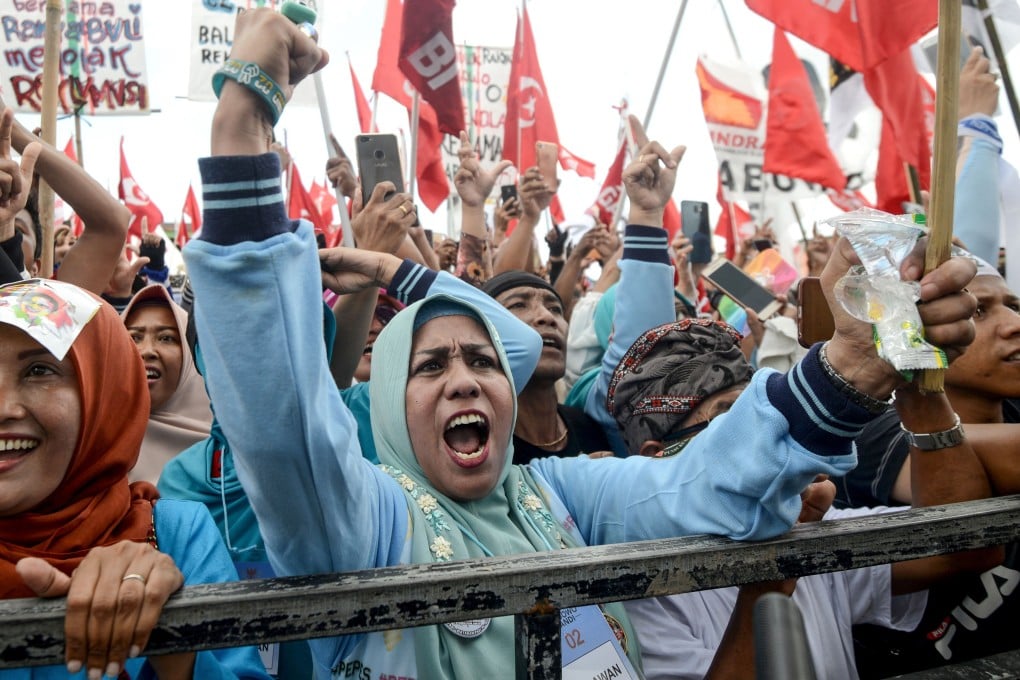Indonesians at a campaign rally on the resort island of Bali on March 26. Photo: AFP
