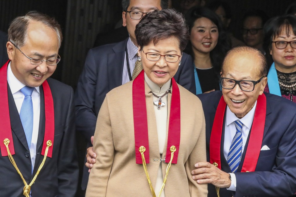 From left, Wang Zhimin, director of the Central Government's Liaison Office; Hong Kong Chief Executive Carrie Lam Cheng Yuet-ngor; and Li Ka-shing, chairman of the Li Ka Shing Foundation, at the opening of his Buddhist art museum at Tsz Shan Monastery in Tai Po. SCMP / Nora Tam