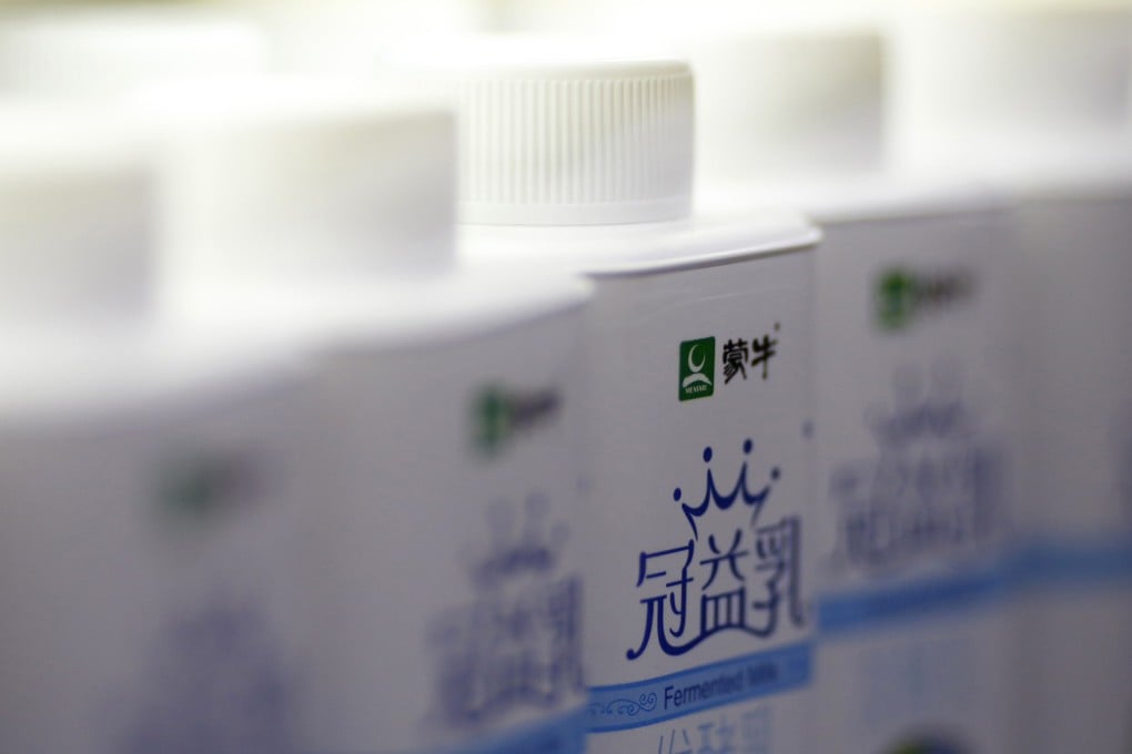 Mengniu’s milk products are displayed at a supermarket in Beijing. Photo: Reuters