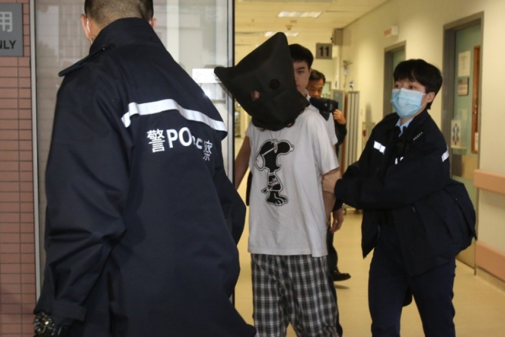 Amina Bokhary is escorted to Ruttonjee Hospital by police on March 17 after her parents accused her of assault. Photo: Handout