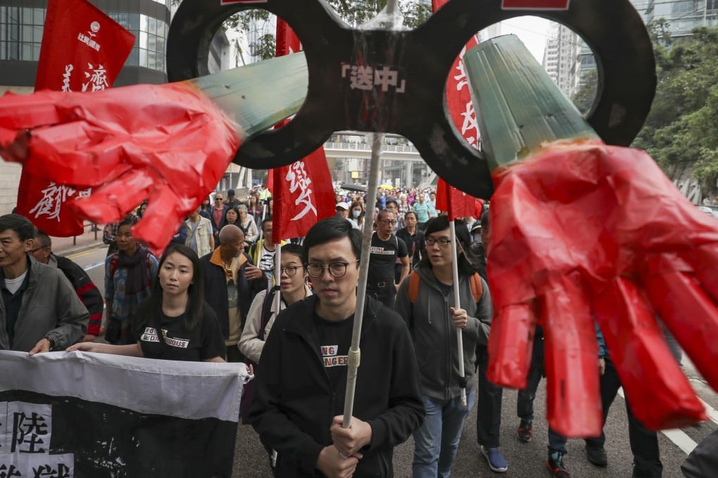 Marchers on the move on Sunday. Photo: Winson Wong