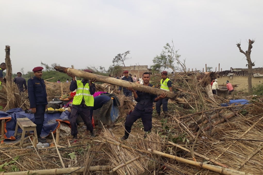 Police conduct rescue operations among damaged houses at Managadwa village in Bara District, Nepal. Photo: EPA-EFE
