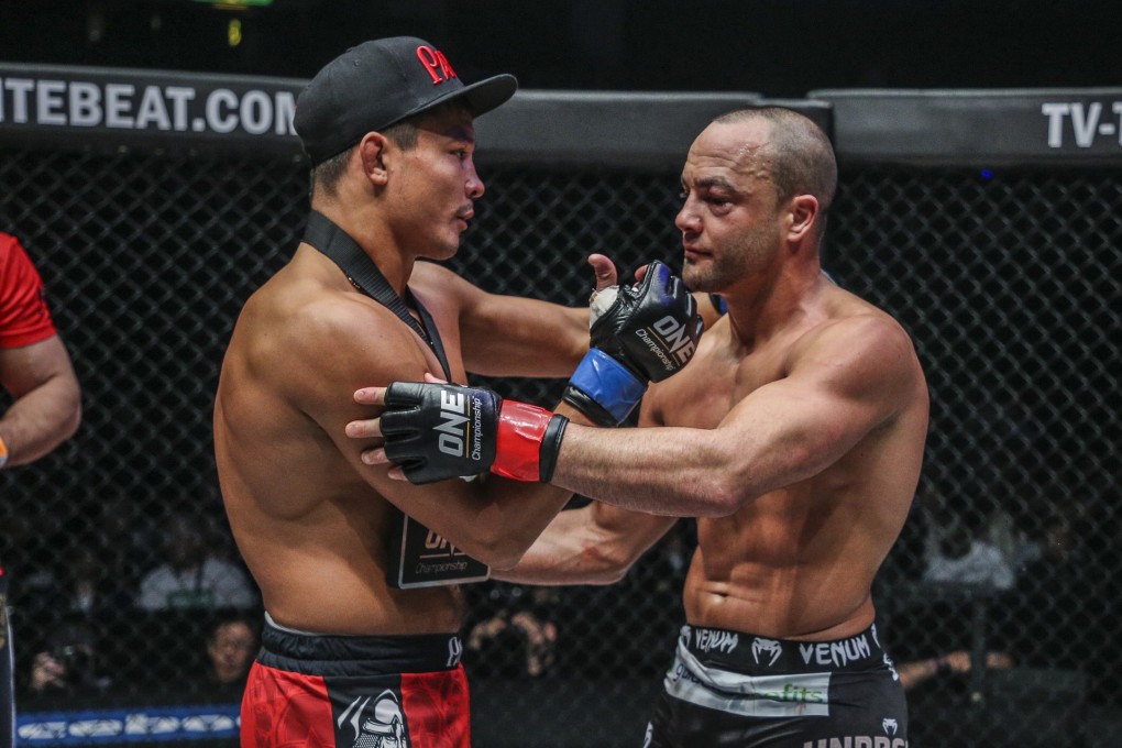 Eddie Alvarez congratulates Timofey Nastyukhin after his shock defeat by the Russian. Photos: One Championship