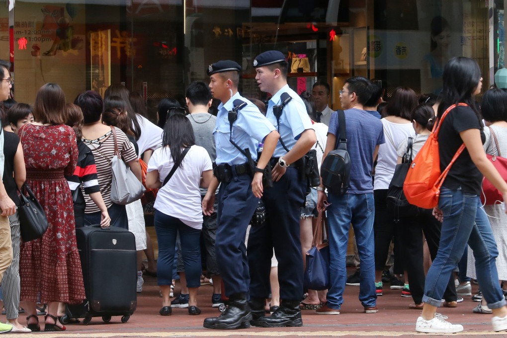 Police officers on the beat in Causeway Bay. Photo: David Wong