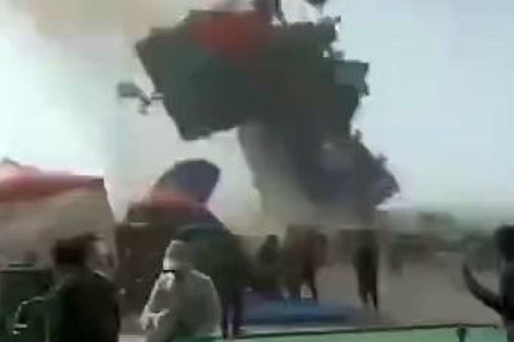 The bouncy castle was blown into the air by a “dust devil” – a vertical whirlwind similar to a tornado. Photo: Weibo