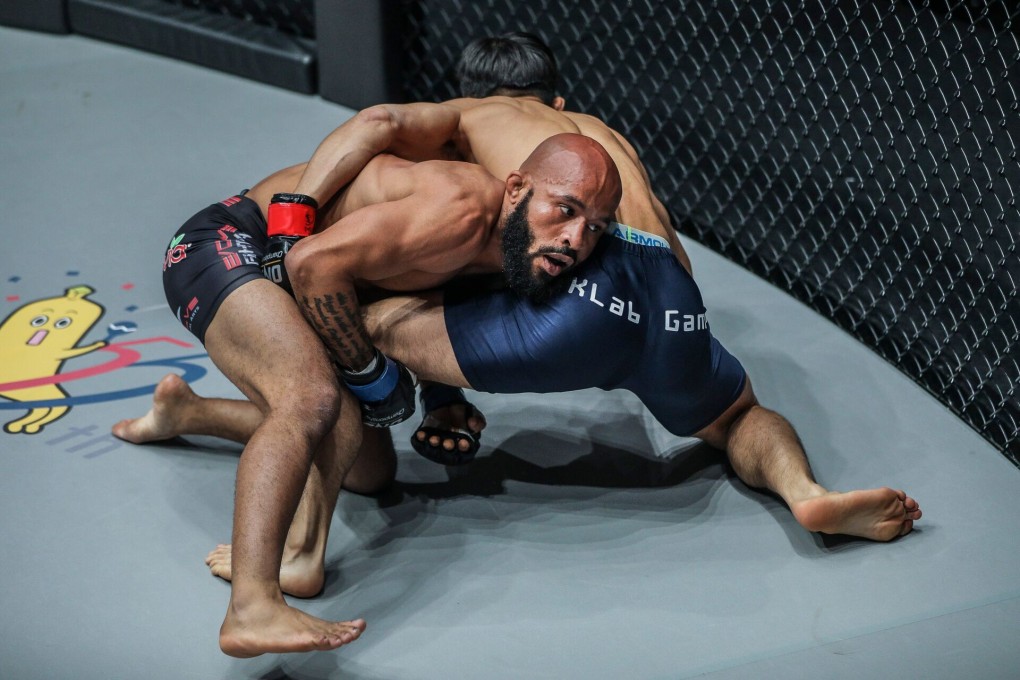 Demetrious Johnson grapples with Yuya Wakamatsu in their One Championship battle in Tokyo. Photos: One Championship