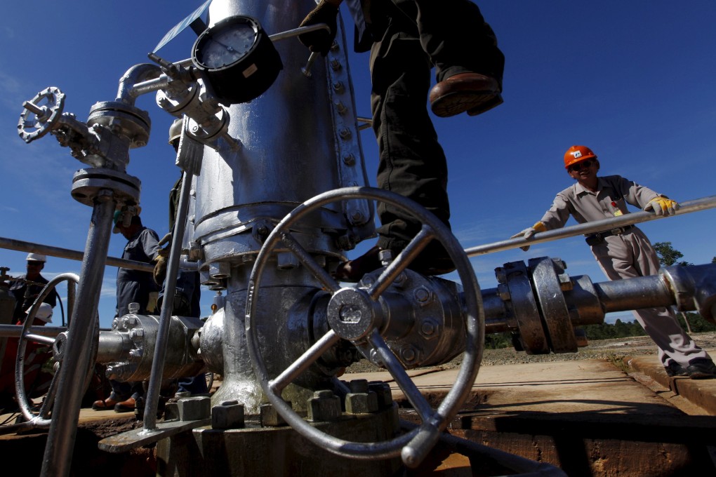 A worker at a crude oil well on Bunyu island, East Kalimantan province. Photo: Reuters