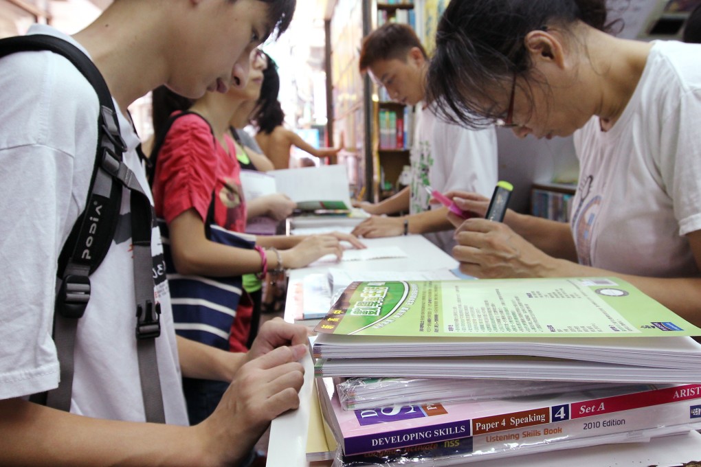 Students buy textbooks at a shop in Mong Kok. Photo: Dickson Lee
