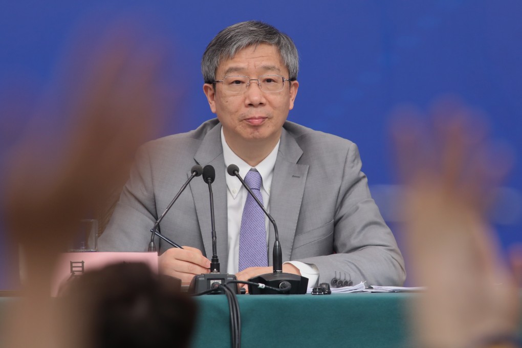Yi Gang, governor of the People’s Bank of China, takes questions from the media on the sidelines of the National People’s Congress in Beijing on March 10. Photo: Simon Song
