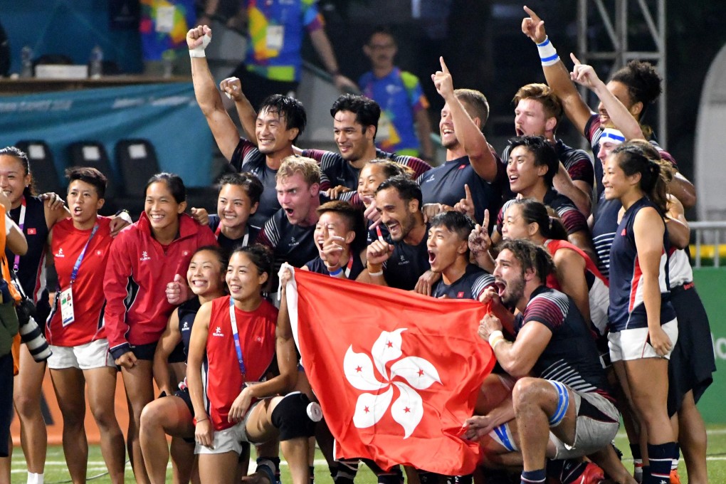 Hong Kong’s men celebrate their gold medal triumph over Japan at the Asian Games in Jakarta. The women lost in the quarter-finals to Thailand. Photo: AFP