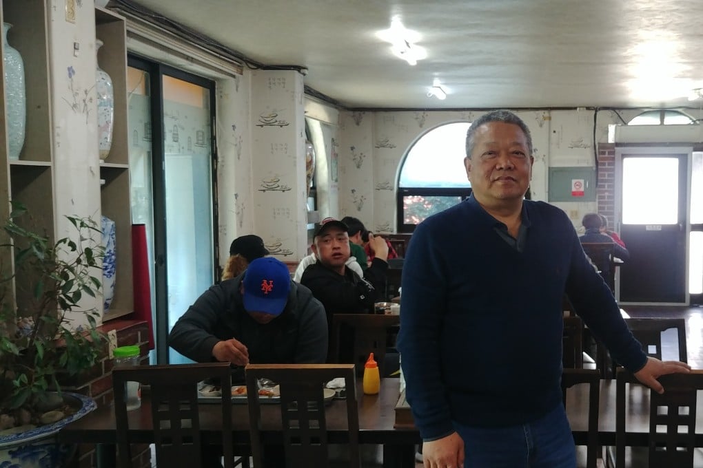 A recipe for success: Ma Jian-xian inside the restaurant that made him a multi-millionaire. Photo: Park Chan-kyong