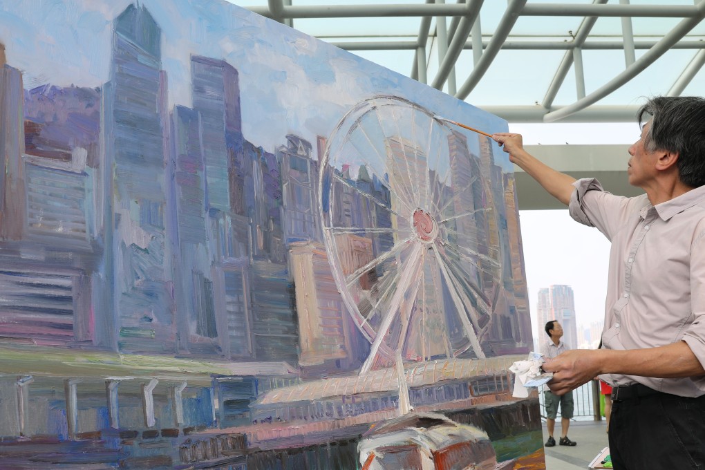 Real estate should be seen as a platform for growth and enhancing the culture of an organisation, writes Edward Farrelly of Marsh. An artist paints the Hong Kong skyline in Central. Photo: Dickson Lee