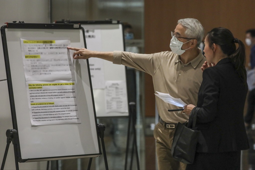 Information about measles vaccinations at Hong Kong airport on Monday. Photo: Felix Wong/SCMP