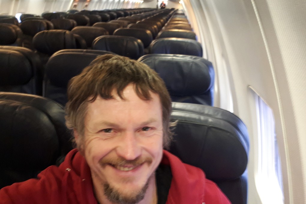 Skirmantas Strimaitis takes a selfie on the Boeing 737-800 while taking off from Vilnius, Lithuania on March 16, 2019, as the only passenger aboard. Photo: Skirmantas Strimaitis/AP