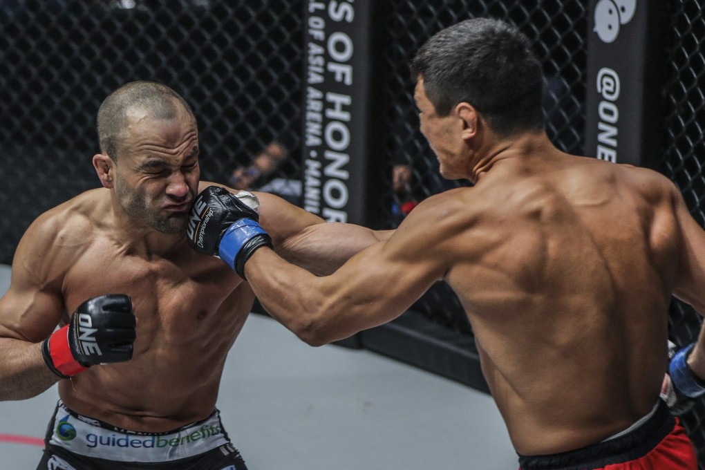 Timofey Nastyukhin catches Eddie Alvarez with a left hand before he spilt open his eye lids during their Tokyo bout. Photo: One Championship