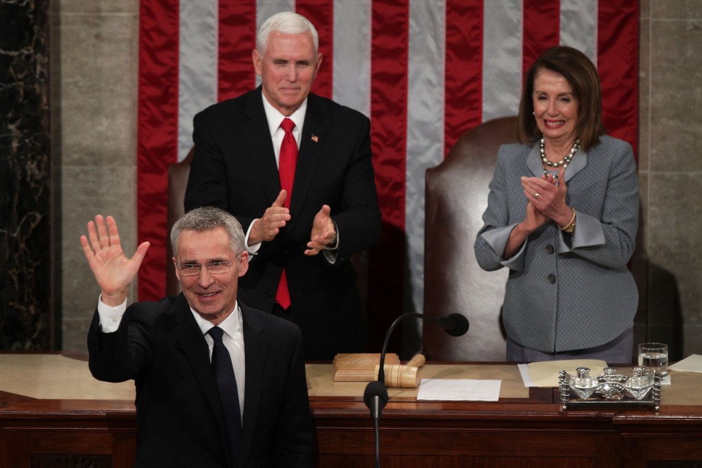 Nato Secretary General Jens Stoltenberg, watched by US Vice-President Mike Pence and House Speaker Nancy Pelosi, acknowledges applause at the end of his address to a joint meeting of Congress in Washington on Wednesday. Photo: AFP
