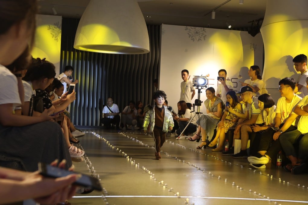 The catwalks of Zhili can be a road to riches for the children who prove a hit there. Photo: the paper.cn