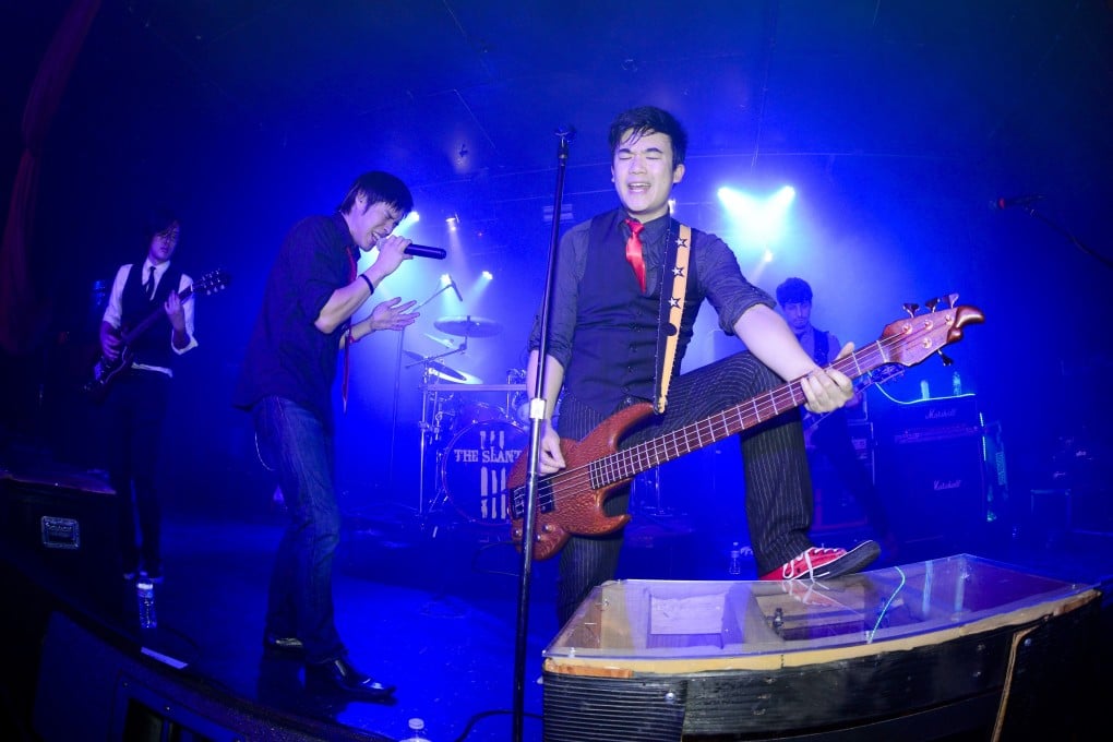 Joe X. Jiang, Ken Shima and Simon Tam of The Slants performing at Dante’s, in Portland, Oregon, in 2016. Photo: Getty Images