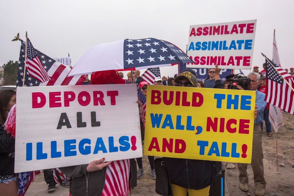 Supporters of US President Donald Trump rally for the president during his visit to see the controversial border wall prototypes on March 13, 2018 in San Diego, California. The border visit is Trump’s first trip to California since taking office. Photo:: Getty Images/AFP