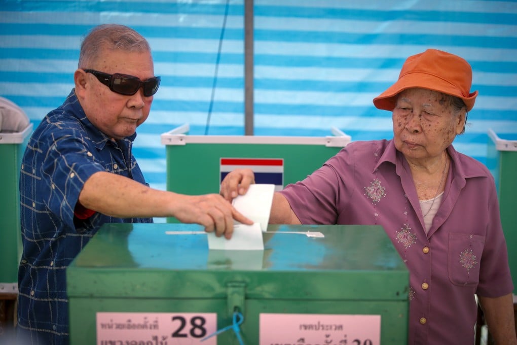 Thai voters cast their votes at a polling station in Bangkok, Thailand. Photo: EPA-EFE