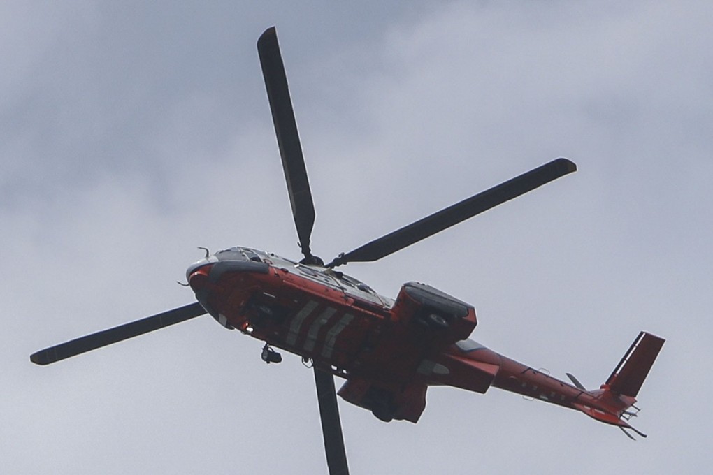 A Government Flying Service helicopter lifted the woman to hospital where she died. Photo: Winson Wong