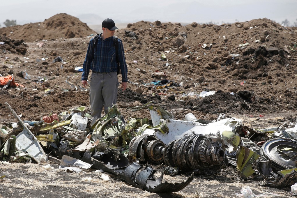 An investigators at the site of the crash, southeast of Addis Ababa, Ethiopia. Photo: Reuters