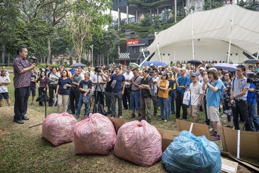 People gather during a protest in Singapore on Hyflux’s debt restructuring plan. Photo: Bloomberg