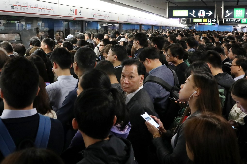 A packed Admiralty MTR station is packed during rush hour. Photo: Nora Tam