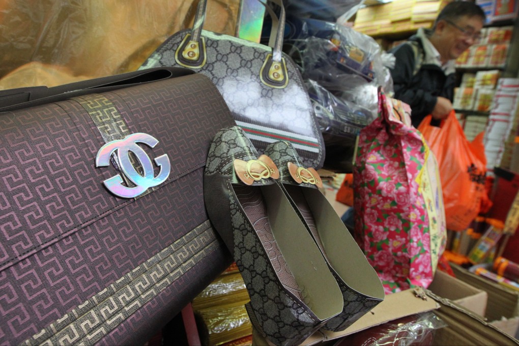 Paper Chanel handbags for sale at a shop in Sai Ying Pun for Ching Ming festival. Photo: Felix Wong